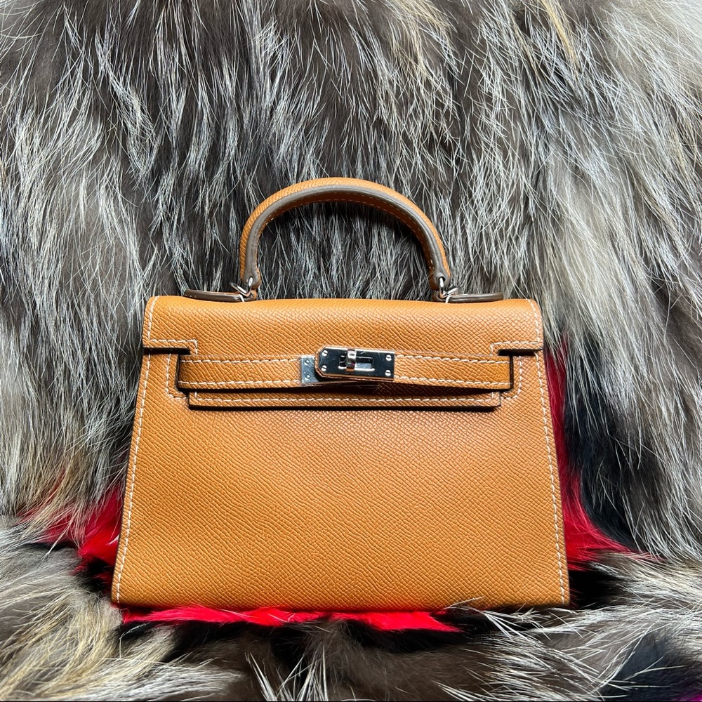Epsom Brown leather 20 cm classic silhouette mini handbag with shoulder strap.